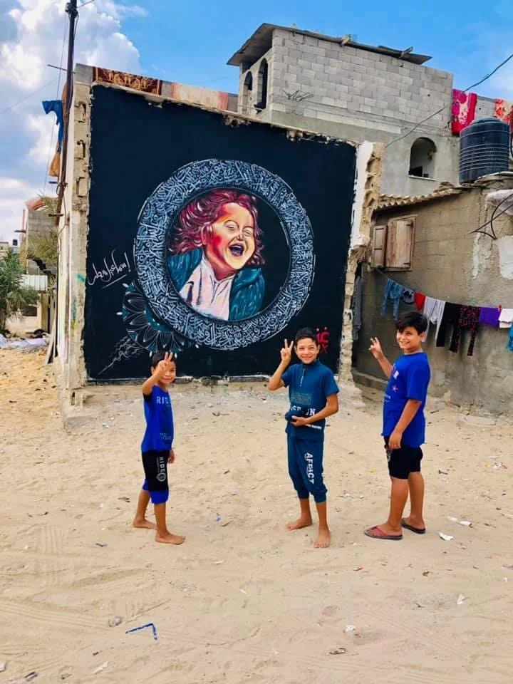 Faces from Gaza mural in Gaza